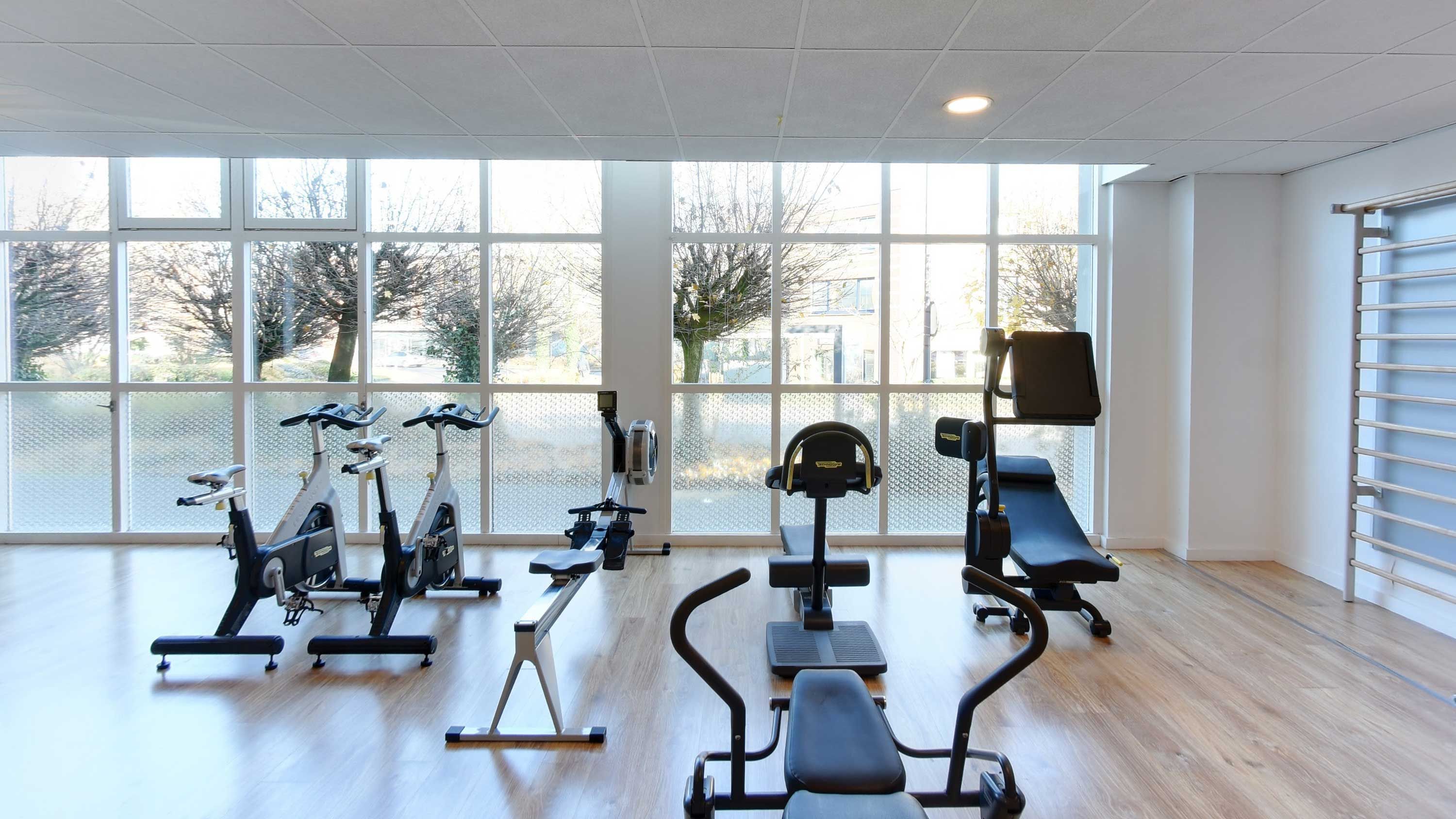 Home gym, wooden floors, exercise equipment